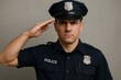 © Татьяна Евдокимова - Portrait capturing a serious police officer saluting with respect and honor, embodying duty and authority against a gray backdrop