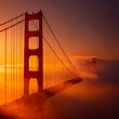 Golden gate bridge shrouded in ethereal fog at sunset, its iconic towers piercing through the mist, bathed in warm, orange light, creating a breathtaking san francisco vista