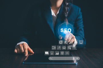 Person working on digital tablet manages search engine optimization, SEO, social media, content, advertisements boost website performance. internet business technology for promoting traffic website.