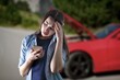 © BillionPhotos.com - Sad woman with broken car on roadside, searching for help.