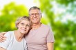 © BillionPhotos.com - Happy active old couple have fun outdoors.