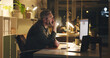 © peopleimages.com - Mature man, reading and computer at night in office with review, work article and deadline. Person, overtime and laptop for research, business info and thinking for draft task in publishing company