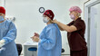 © Georgii - Healthcare workers preparing for surgery in a clean and modern operating room