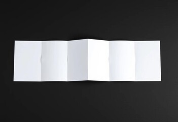 clean trifold white paper mockup on black backdrop, ideal for design presentations, template, layout