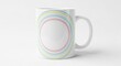 © Erisna Yolanda - A white ceramic mug with a rounded handle is set on a white surface. The body features concentric pastel-colored rings