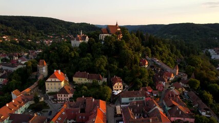 Wall Mural - School hill of Sighisoara Romanian old city at sunset. Aerial view