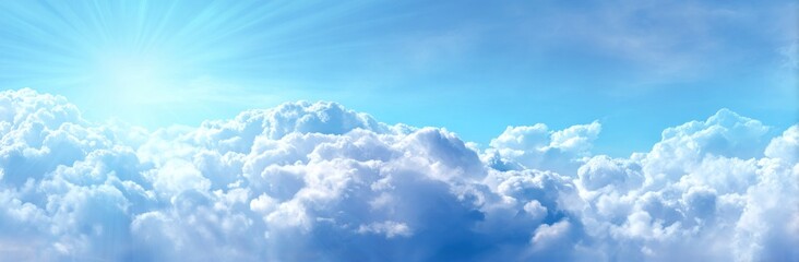 Wall Mural - Stunning panoramic view of fluffy white clouds against a bright blue sky, illuminated by a radiant sun with visible light rays