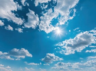Wall Mural - Sunny sky with fluffy clouds scattered across a bright blue expanse, with sun glinting radiantly as the focus