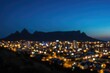 Urban skyline during twilight with vibrant night illumination