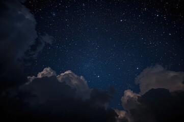 Wall Mural - star-filled night sky covered by a thick layer of clouds