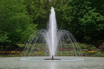 Wall Mural - Stunning water show in a famous garden on an island