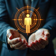 © miss irine - Hands hold illuminated human figure target. Person centered business strategy concept focuses on people for digital transformation. Human resources management, talent acquisition, recruitment.