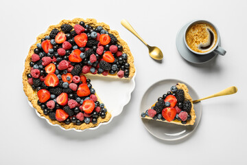 Wall Mural - Plate with delicious berry pie and cup of coffee on white background