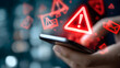 © Daniel - SMS spam, fake text message phishing from scammer cocept, System hacked red waning alert, email hack, scm malware spreading virus n message alert virtual onmobile phone screen in peron hand