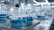 © Harry - Stunning laboratory glassware filled with vibrant blue liquid ready for scientific research and development in a modern lab environment