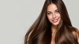Beautiful model with long, shiny hair, natural smile, posing for a shampoo advertisement. Healthy, shiny hair, clean, bright background, soft studio lighting.