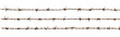 © cang - Three rows of rusty barbed wire against a black background