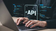 © Muhammad Adnan - Api development concept application programming interface coding software development on laptop screen