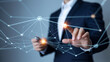 © Muhammad Adnan - Man touching digital network interface for global business connection and data communication system