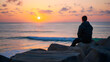 © MD ZIHAD HASAN - Serene Sunset Ocean Wallpaper: Man Silhouetted on Rocks, Peaceful Coastal Scene