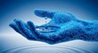 © Mani - A digital hand holding water with circuit patterns in a blue abstract technology background