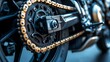 © RATAN - Close up detailed view of a motorcycle s golden drive chain and rear sprocket assembly for power transmission