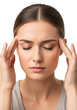 © Hortensia - Young caucasian woman, mid-20s, closed eyes, massaging temples, simple top, bright white studio background, close-up portrait, concept of self-care seeking relief