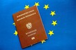Austria passport on European union blue flag background. Citizenship in countries of Europe