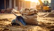 © Sari - Construction site sandbag and shovel