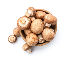 Wall Mural - wooden bowl with raw champignon mushrooms isolated on white background, closeup
