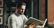 © ChasingMagic25/peopleimages.com - Business, online reading and man with tablet, research for publication and copywriting. Person, employee and journalist in office, tech or magazine website with email for newsletter or app for column