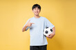 © Q88 - Enthusiastic young soccer player on yellow background Ready for the match? Check it out now!