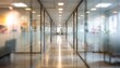 © hao - Blurred office hallway with glass walls and neutral colors creates a sense of space. Professional photos for backgrounds for text, banners, posters, and web displays. High quality