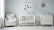 © Ari - A minimalist nursery with white furniture, a crib containing a teddy bear, a star mobile, and a changing table against a light blue wall