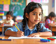 © AhosanHabib - Young girl drawing in classroom during back to school season