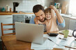 © Geber86 - Young father and daughter using a laptop together in the morning
