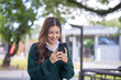 © maeching - Students playing with mobile phones and laughing
