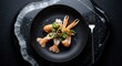 © Mikhail - Luxury restaurant dish with cooked langoustines and edible flowers on a modern black plate