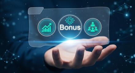 Hand holding transparent digital display showing bonus concept with growth chart, network, and team icons, symbolizing business growth, reward, and employee success