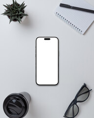 Wall Mural - Smartphone with blank screen on office desk with accessories