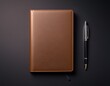 © Johnny - simple brown notebook and pen on a dark flat surface create a clean and professional image suitable for various applications