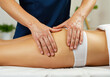 © Gianpiero - Professional treatment an expert masseur applies oil and massages a woman's glutes for well-being.