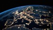 Europe at night from space, showing city lights.