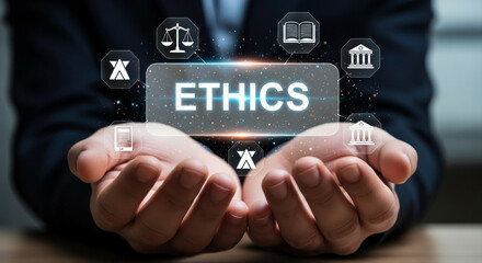 Ethical Hand: A conceptual image featuring hands cradling the word ETHICS amidst an array of associated symbols, evoking the essence of moral principles.