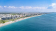 Aerial drone view of Antalya cityscape and Konyaalti beach, people sunbathing on sand, swimming in sea and relaxing, Antalya holiday vacation resort in Turkey