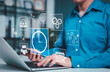 © Supatman - Time Management and Productivity Optimization Concept. Business professional using laptop with digital icons representing time tracking, productivity, project scheduling, and task coordination at work