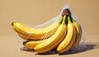 © Vadym - Bananas packed in plastic bag. Ripe yellow fruit bunch, transparent packaging. Food concept with minimalist, modern design. Macro photo with contrast, high-colored, clean background. Relates to eco