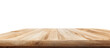 © Iwan - Light brown wooden table top against a black background