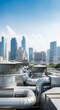 © Margarita Ratatosk - Roof top ventilation and air conditioning system on a modern building in cityscape. Industrial HVAC units with large metal ducts and vents for heating and cooling.