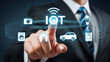 © Nizam - Businessman activating Internet of Things with a touch of genius